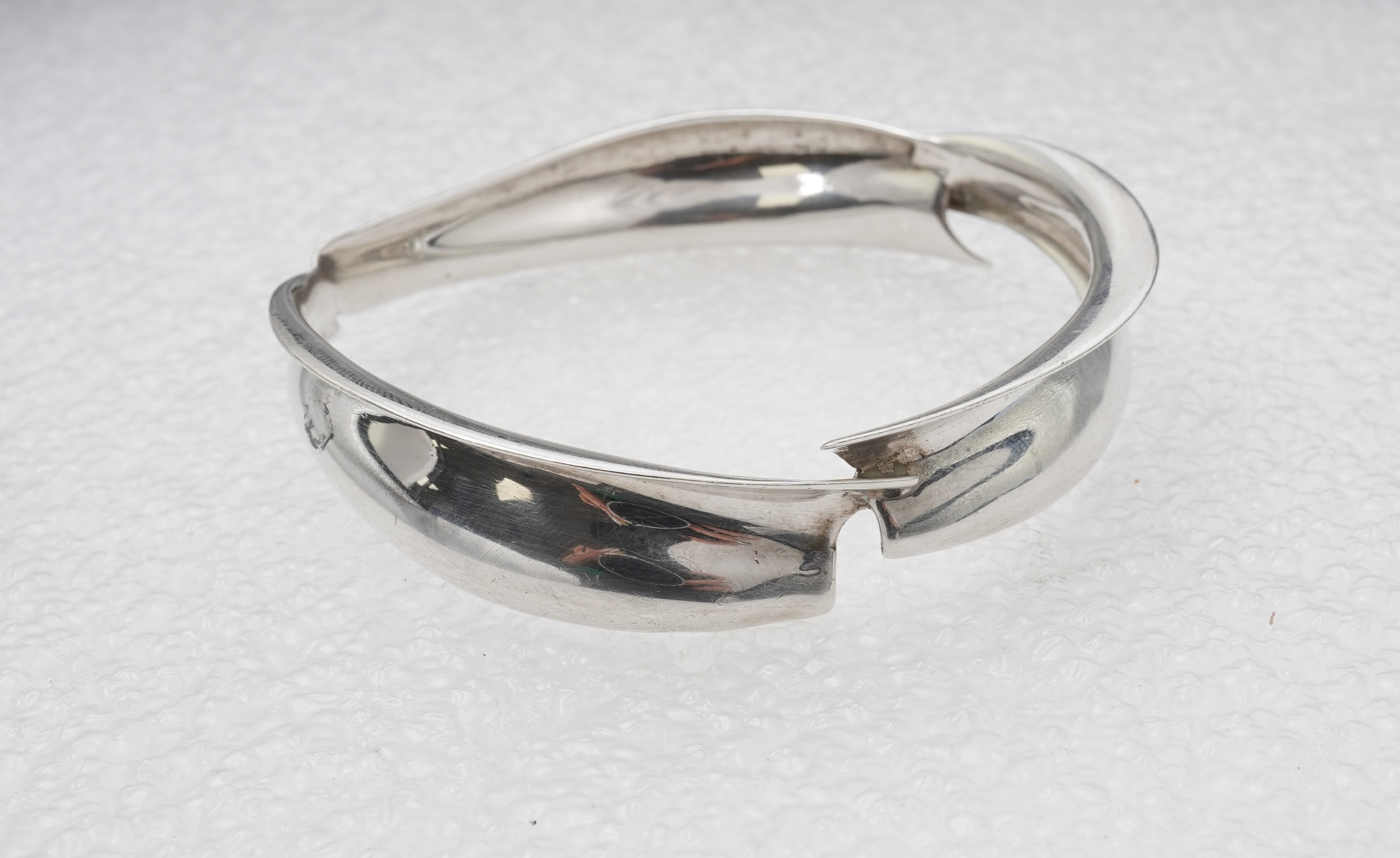 Frank Gehry for Tiffany & Co., a silver 'Fish' bangle, circa 2008